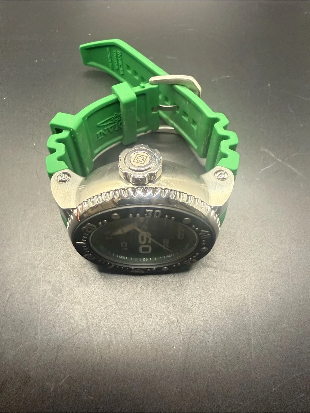 Invicta Pro Diver watch features a bold green dial And Band New Battery
